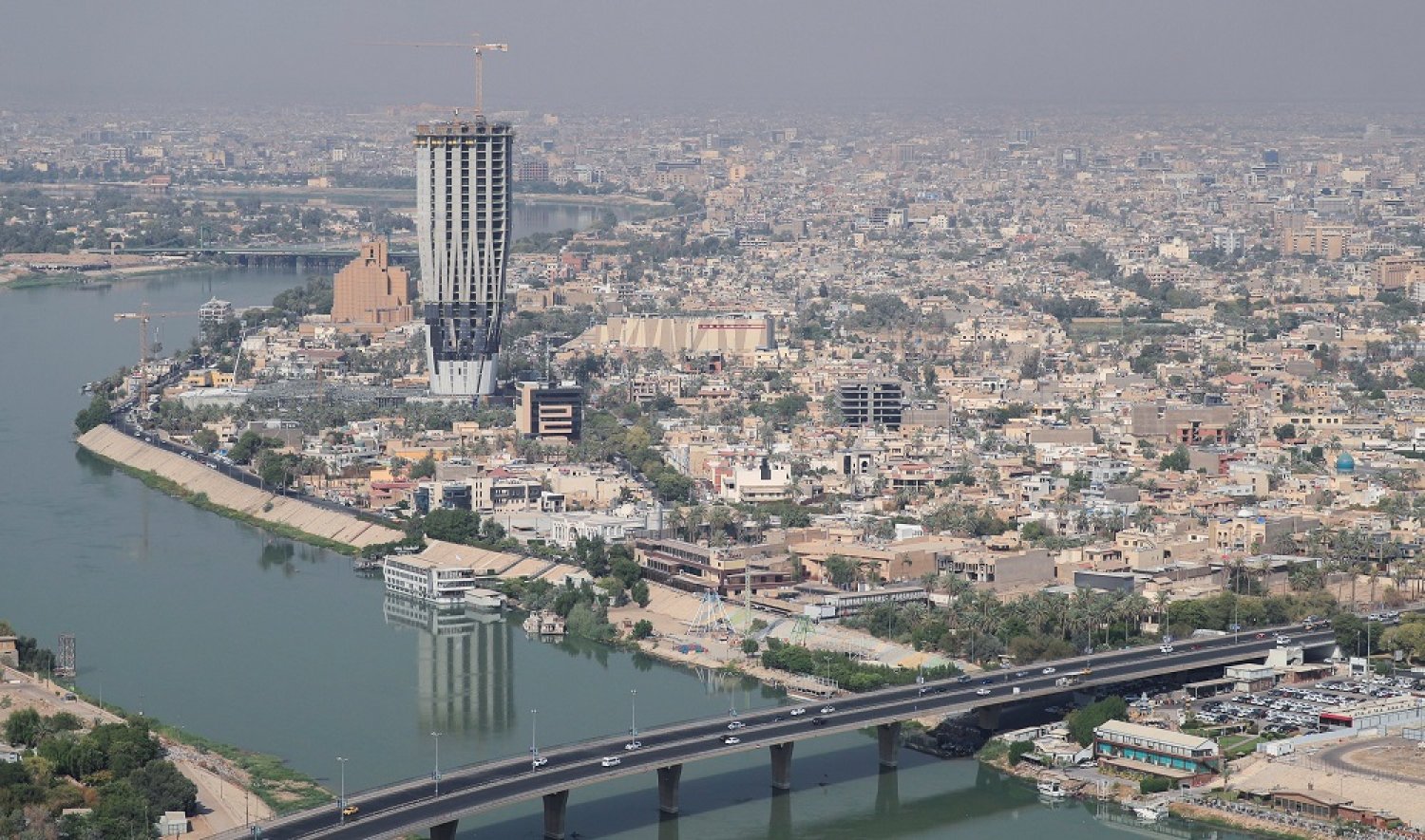 an aerial view of baghdad iraq aug. 11 2021. reuters at Stratus Private Jet